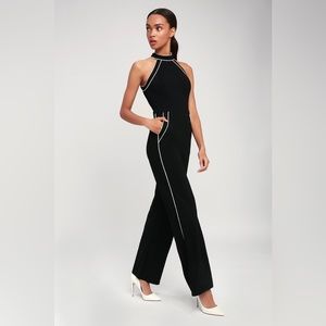 Black jumpsuit with white pinning